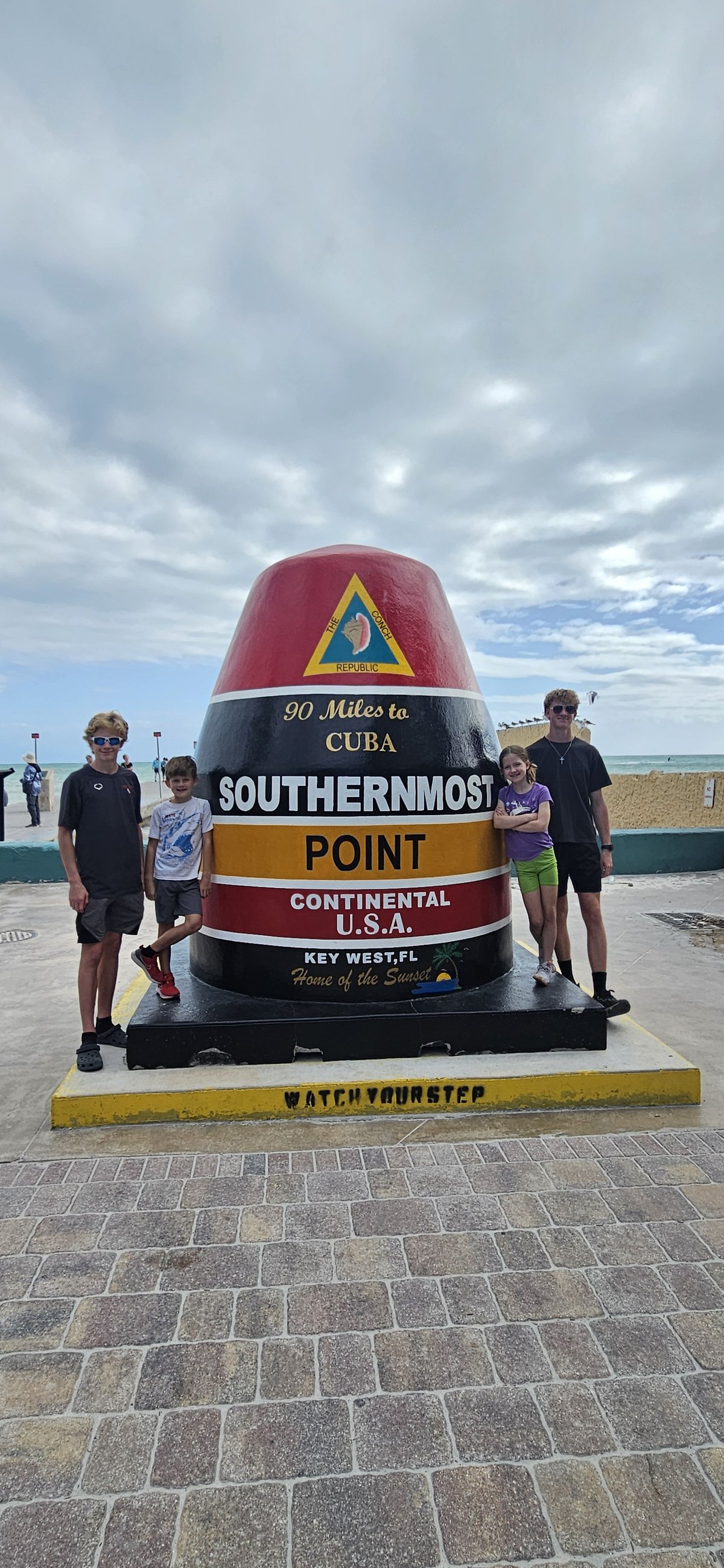 The kids at the Southernmost Point in Key West